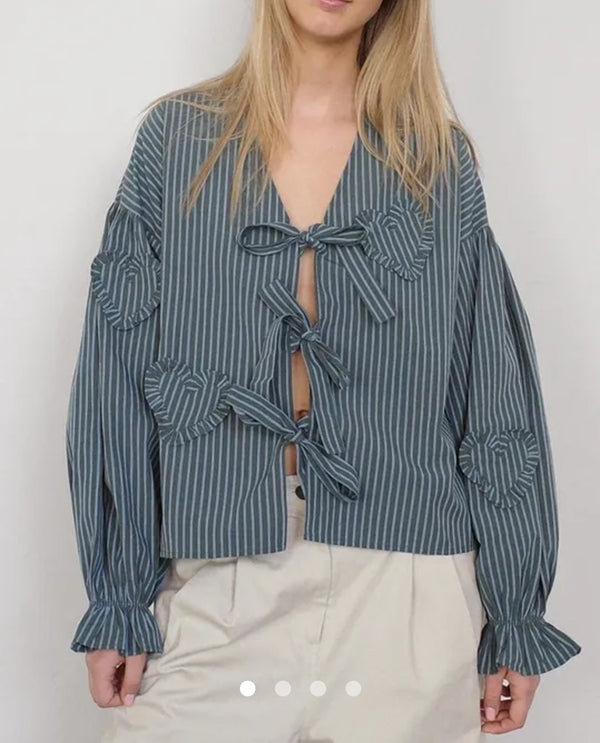 Ruffle placket blouse